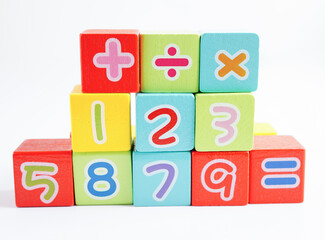 Number wood block cubes for learning Mathematic, education math concept.