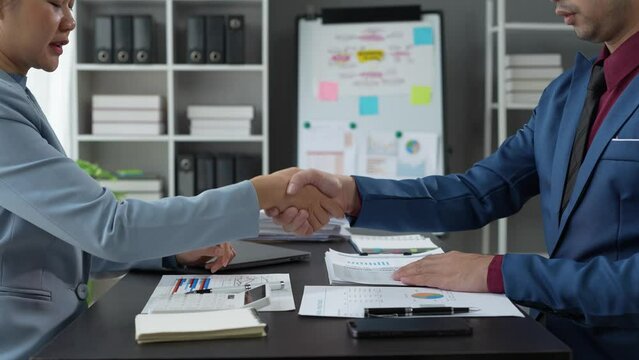 Business partnership meeting concept. Image businessman s handshake. Successful businesswomen handshaking after a good deal.