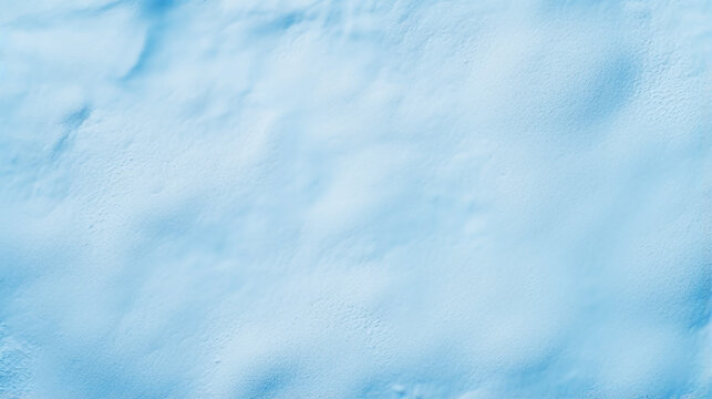 fresh real snow texture background in blue tone