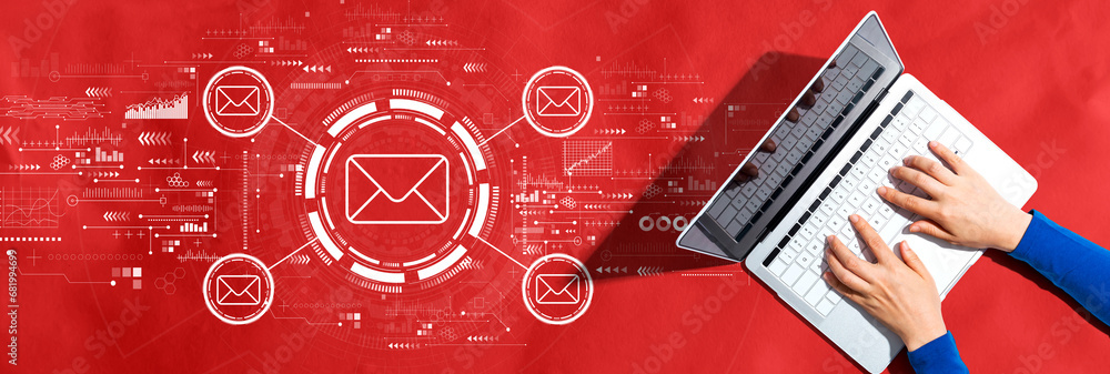 Poster email concept with person using a laptop computer