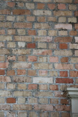 Fill in a photo frame of a neatly arranged brick wall, suitable for a house facade