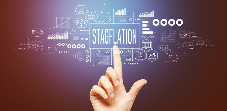 Stagflation theme with hand pressing a button on a technology screen