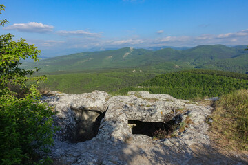 Mangup-Kale cave city, sunny day. Mountain view from the ancient cave town of Mangup-Kale in the...