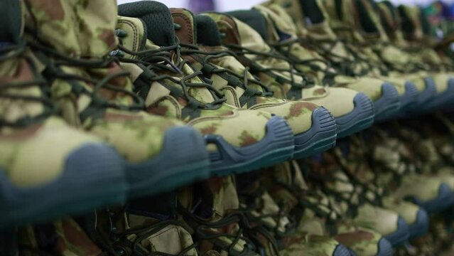 Footwear for the military. Khaki boots.
