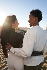 Obraz premium Interracial Couple at The Beach Together in Love Enjoying Each Other Company 