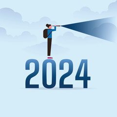 Fototapeta premium business women with binoculars climb up on year 2024