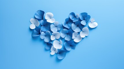  blue and white flowers arranged in the shape of a heart on a light blue background, top view, flat layed out, with copy - space for text.
