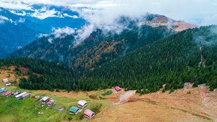 Mountain view and old plateau houses in Pokut Plateau in Rize and a magnificent landscape photo.