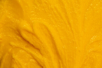 Fruit yogurt ice cream. Smoothies from fresh fruits and berries. Ice cream texture. Delicious sweet dessert close-up as a background.