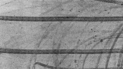 Aerial view tire track mark on asphalt tarmac road race track texture and background, Abstract...