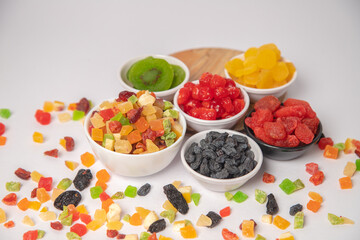 Mixed nuts on white bowl with white background, mixed dry fruits and nuts on white bowl with white background
