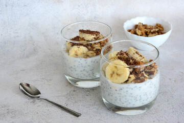 healthy breakfast with chia pudding, walnut and banana slices 