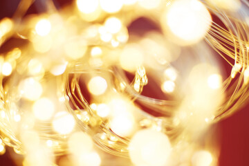 christmas beautifull shiny gold and red background. sparkle festive blurred bokeh