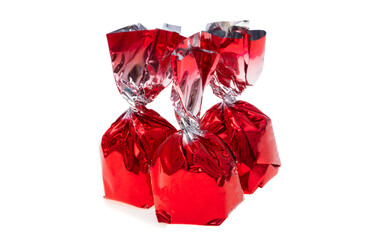 chocolate candy in red wrapper isolated