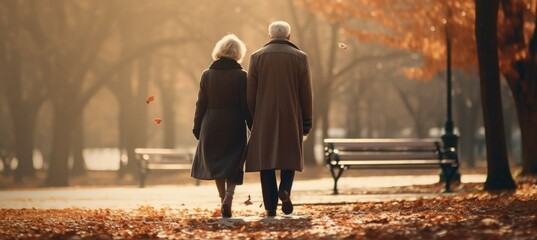 An old man and a woman walking down a path in a park. Generative AI.