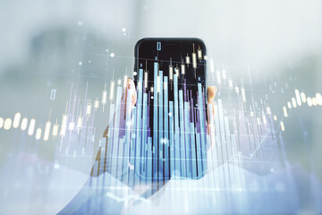 Multi exposure of abstract creative financial chart and hand with cell phone on background, research and analytics concept