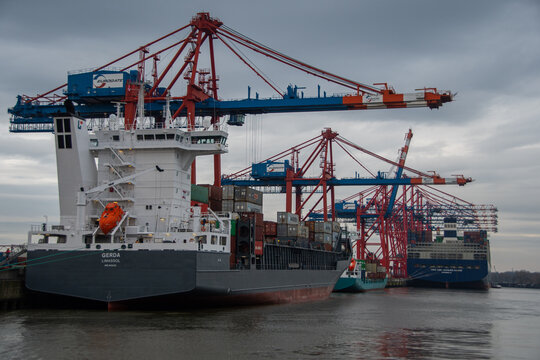 Hamburg, Germany  17 March 2023,  Large container ships are loaded at the port of Hamburg