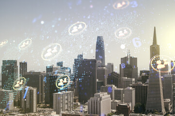 Double exposure of social network icons interface and world map on San Francisco office buildings background. Networking concept