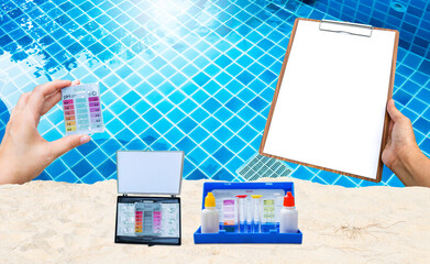 Mini water tester test kit with clipboard in girl hand over clear swimming pool water, best water...