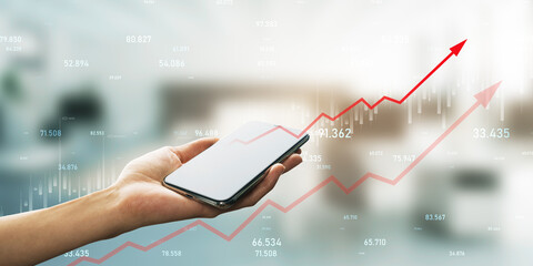 Smartphone displaying stock market trends and progress charts