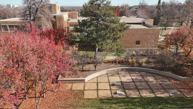University of Northern Colorado sign and rise to see Carter Hall.