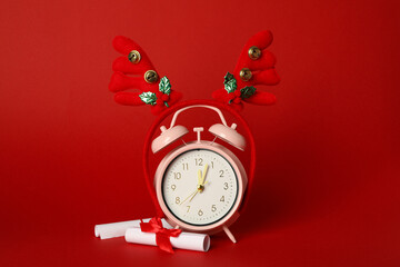 Clock with deer horns, new year concept.