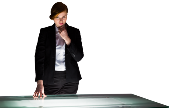 Digital png photo of pensive caucasian businesswoman standing at table on transparent background