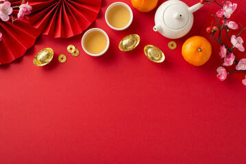 Chinese New Year Feast Delight. Top-view shot showcasing red envelopes, traditional ornaments, tea...