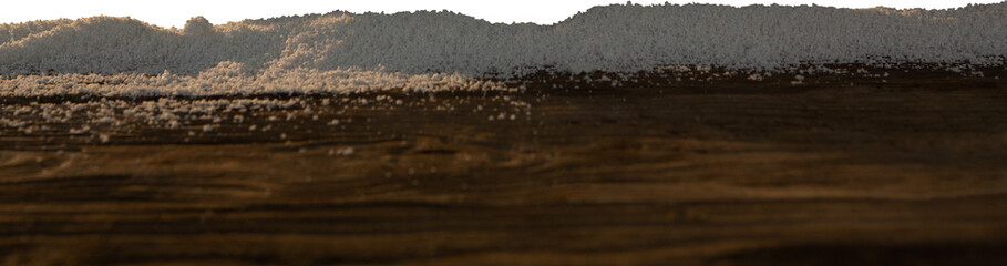 Digital png illustration of brown wood with sand with copy space on transparent background