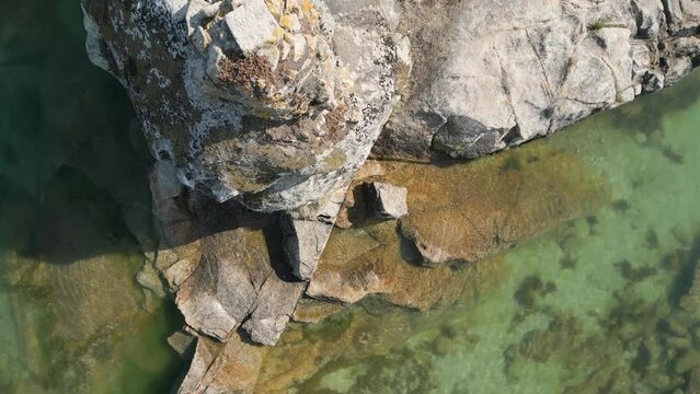 Drone footage over the rocky cliffs on Aldan coast in Pontevedra, Galicia, Spain
