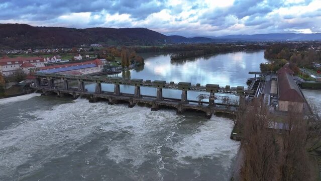 Hydroelectric power plant Augst by high water level of Rhine river, drone  pan 4k