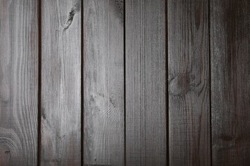 Naklejka premium Texture of dark wooden surface as background, top view