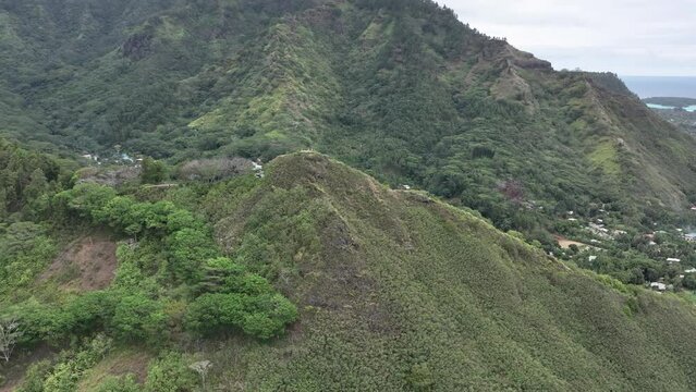 Magic Mountain Peak Overlooking The Seascape In Moorea-Maiao, French Polynesia. - aerial orbit shot