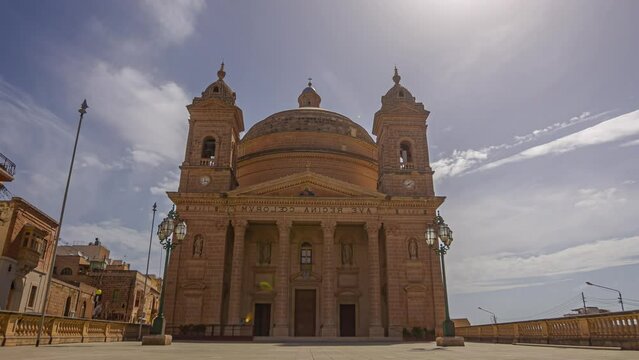 Parish Church Of The Assumption of the Blessed Virgin Mary into Heaven in Mġarr, Malta. Timelapse
