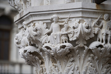 Sculptures of Pisces, Jupiter, Sagittarius on the pillar of the Doge's Palace (Italian: Palazzo Ducale). Venice - 5 May, 2019
