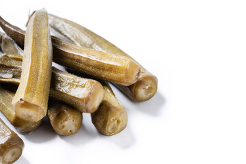 Okra slices isolated on white background. Copy space