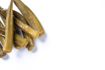 Okra slices isolated on white background. Top view. Copy space