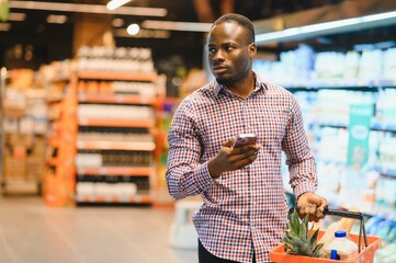 African american Man shopping in a supermarket