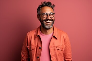 Obraz premium Portrait of a handsome smiling, happy and pleased man with positive vibes. Human person dressed in fashionable, colorful and fun clothes. Generative AI, AI