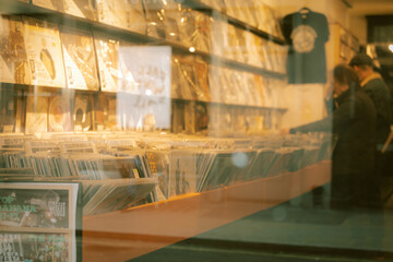 Outside shot of a record store with reflections in london