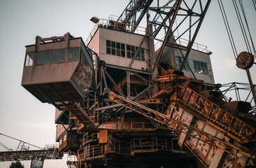 Fototapeta na wymiar old crane in port working with metal