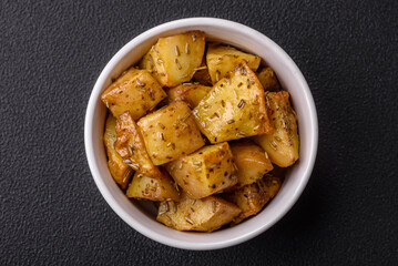 Delicious crispy fried potato wedges with salt, spices and herbs