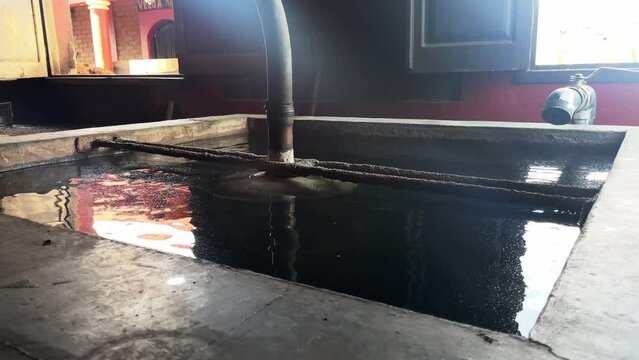 Mezcal Oaxaca Mexico famous popular drink alcoholic beverage artisanal distillery production close up