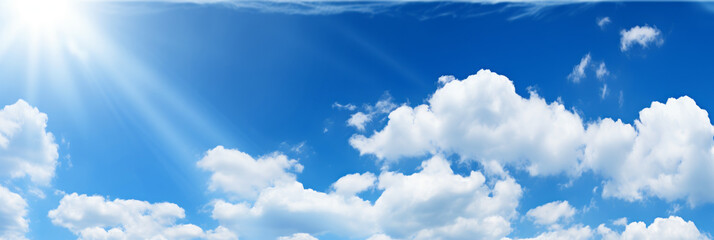 Heaven of blue sky, sun and clouds. Panoramic banner. Copy space where you can easily insert text such as advertisements.