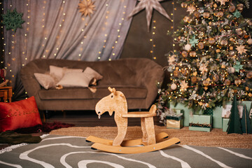 Wooden rocking horse, handmade wooden toy in Christmas room