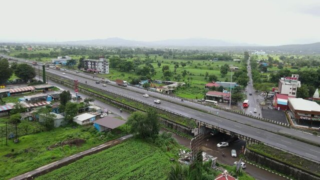 aerial view of Mumbai pune highway. traffic moving on Indian highway.
