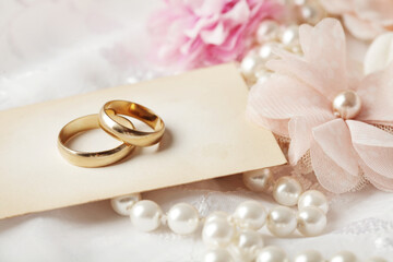 wedding rings, wedding invitation, pearls and flowers - 682235662