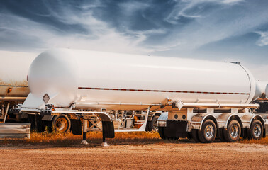 Flammable cargo. Full tank of petrol in the refinery ready for transport with a truck