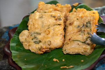 Fried corn cakes, a typical Indonesian fried food as a side dish to complement the dish
