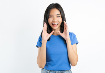 Smiling asian woman hand cupped over his mouth to say something on white background.